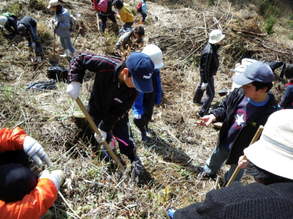 Children planting trees