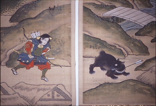 Arayori shooting an arrow at the bear (detail from the Tateyama Mandala, Daisenbō A version; collection of Daisenbō, Ashikuraji)