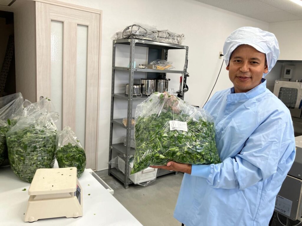 Dhalma Lama at the vegetable processing facility