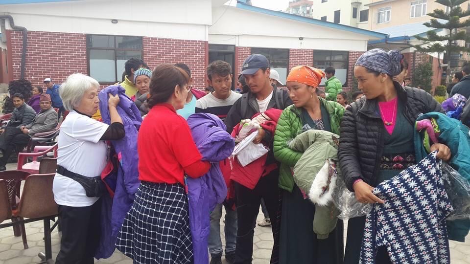 Ms. Kawabuchi distributing emergency supplies