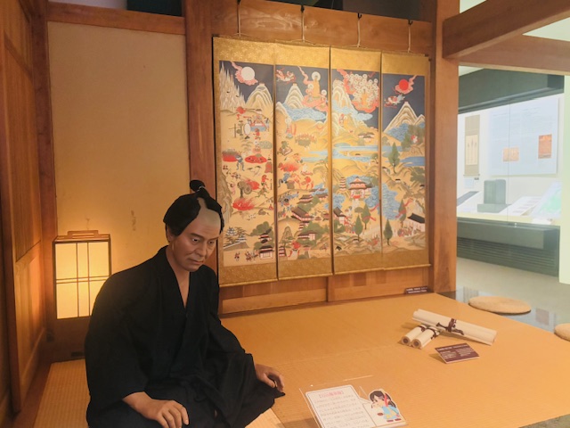 Reconstruction of a dannaba (regional network of followers), diorama display