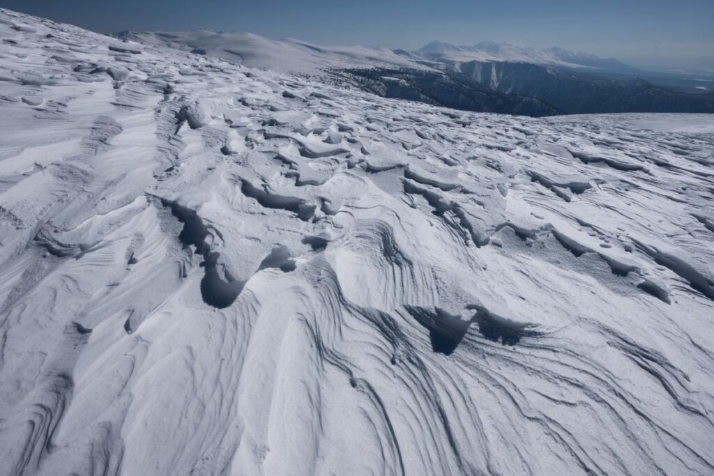 View of Scavla and Tokachi mountain range from the trail of Mt. Asahidake